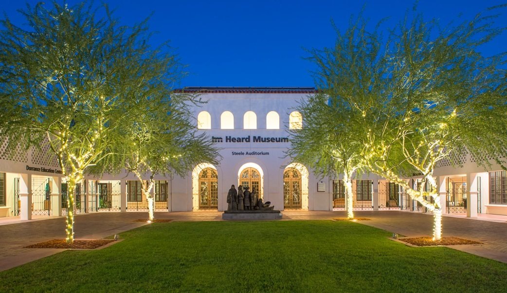 The Heard Museum courtyard lit up at dusk