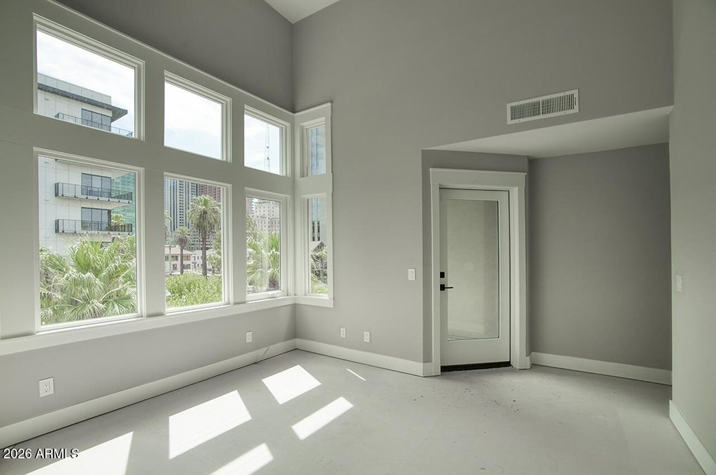 Shell-stage living space with sliding door to balcony at 808 N 2nd Avenue, Phoenix