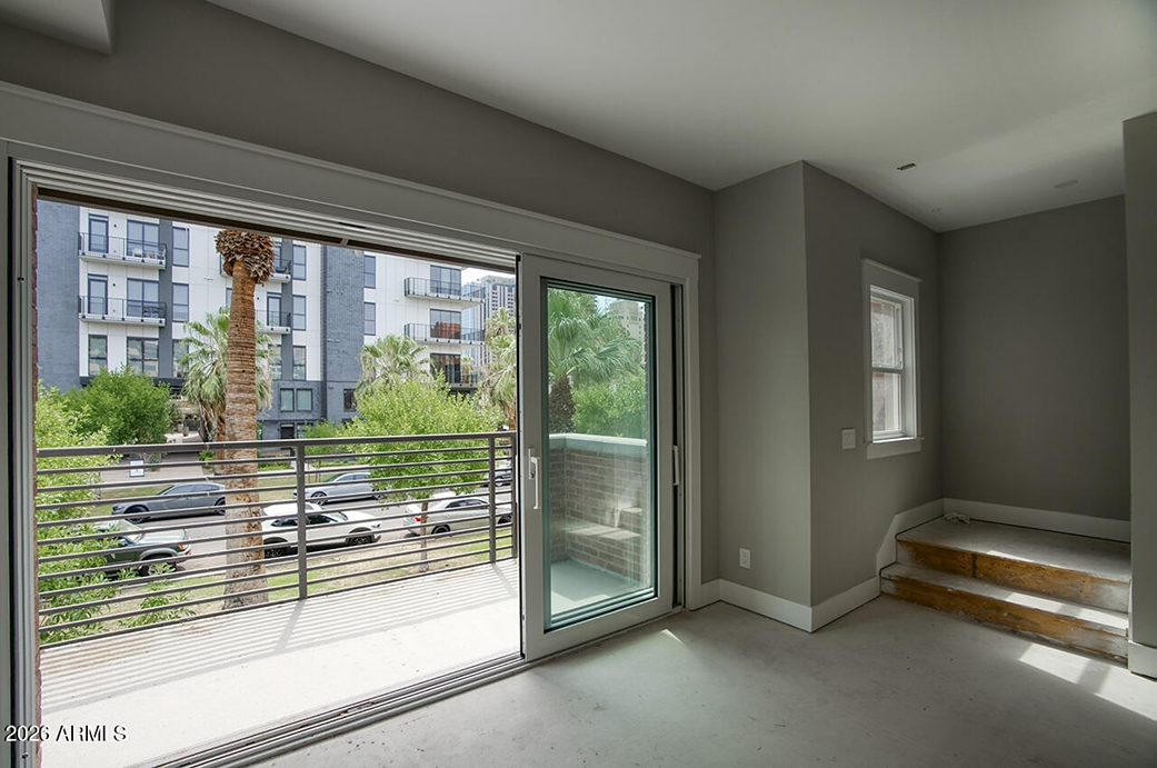 Shell-stage room with vaulted ceiling and large windows at 810 N 2nd Avenue