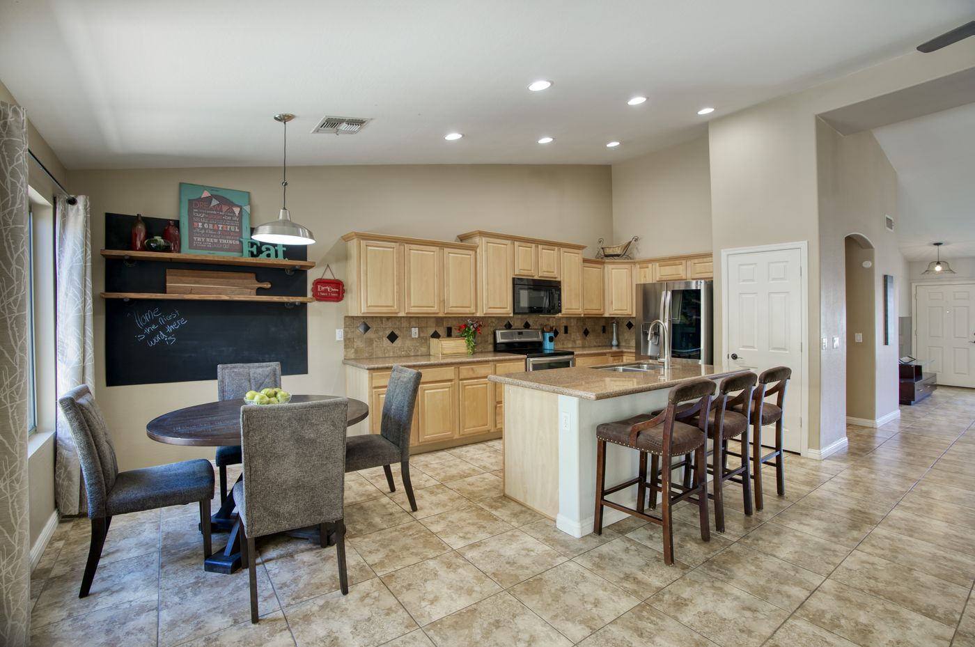 Open kitchen and dining area at 15968 W Jefferson Street, Goodyear
