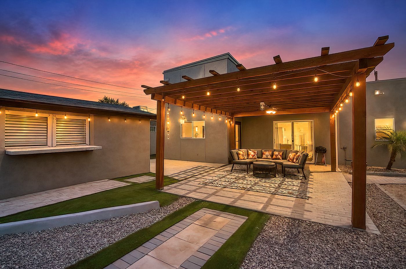 Backyard bonus structure with pool table and bar at 1058 E Whitton Avenue